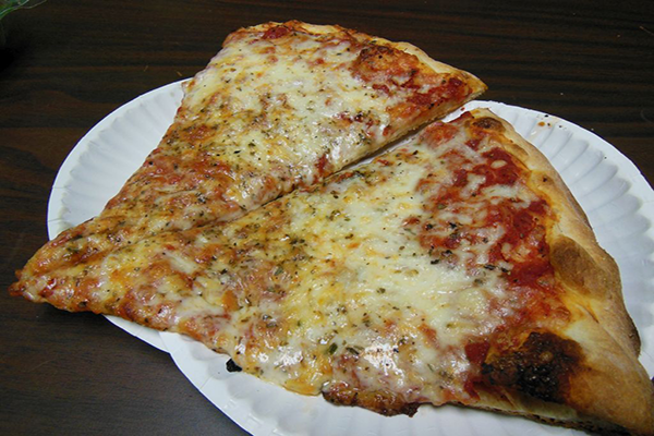 Two slices of thick-crust pizza on two white paper plates | 125 N Lumpkin St, Athens, GA 30601